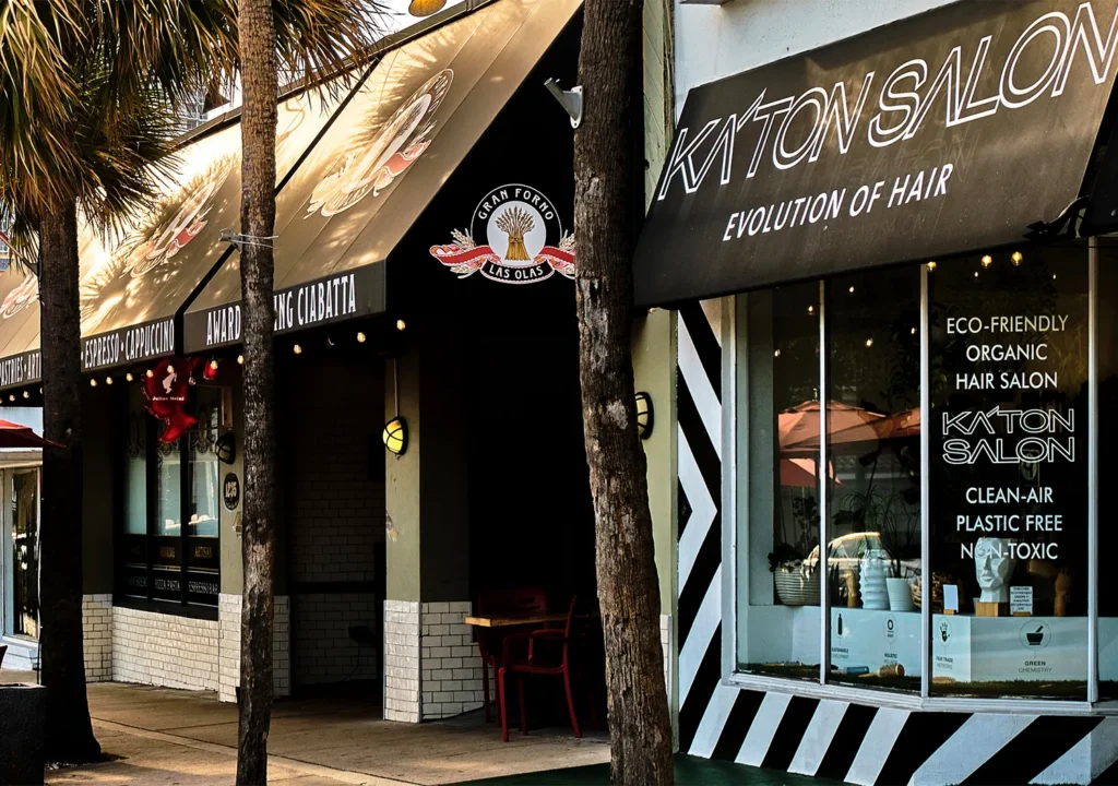 Storefronts for Gran Forno Las Olas bakery and Katon Salon, which provides haircuts and blowouts, featuring branded awnings and window signage. - Ka'ton Salon, Fort Lauderdale FL